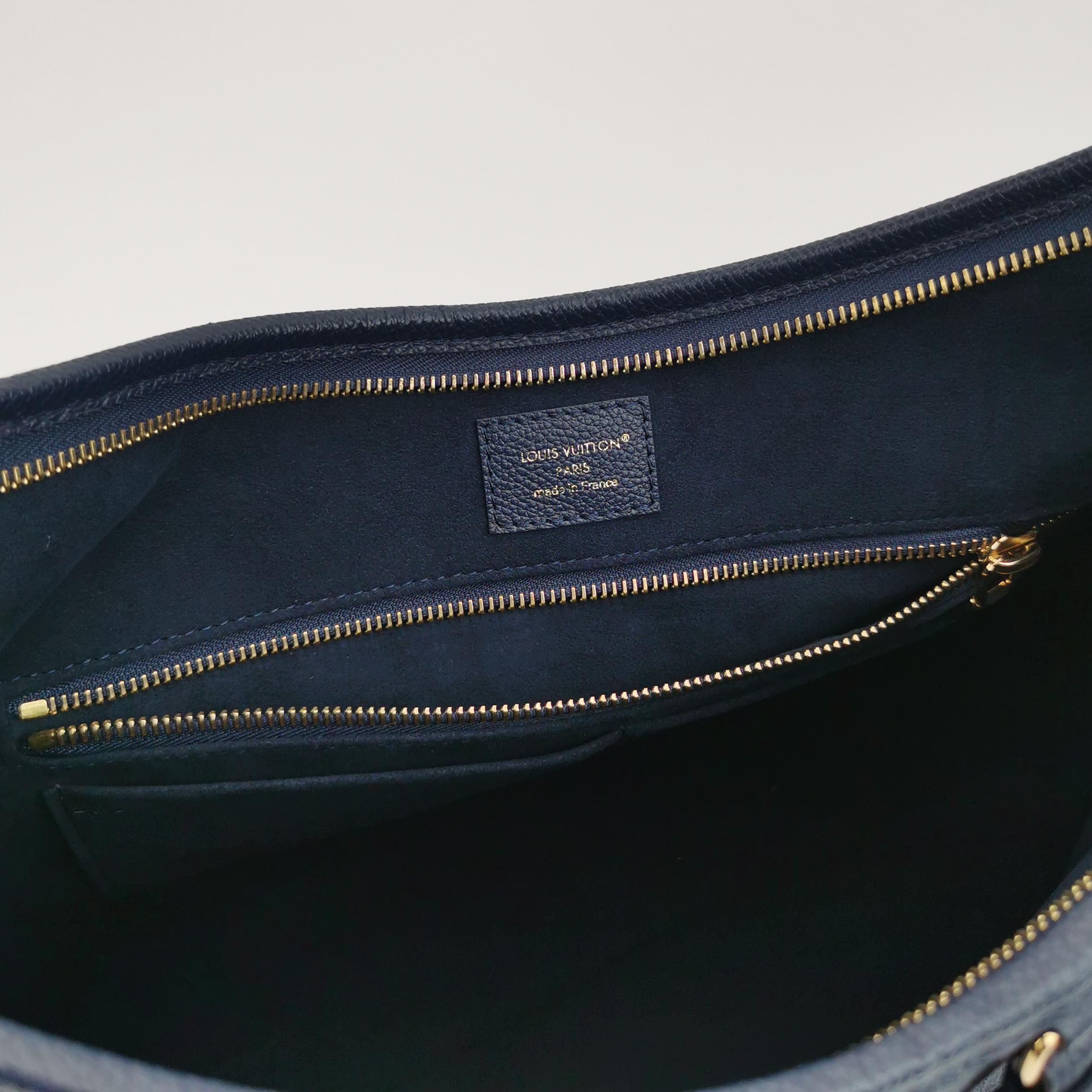Louis Vuitton CarryAll MM in Black Taurillon Monogram Empreinte Leather view 8
