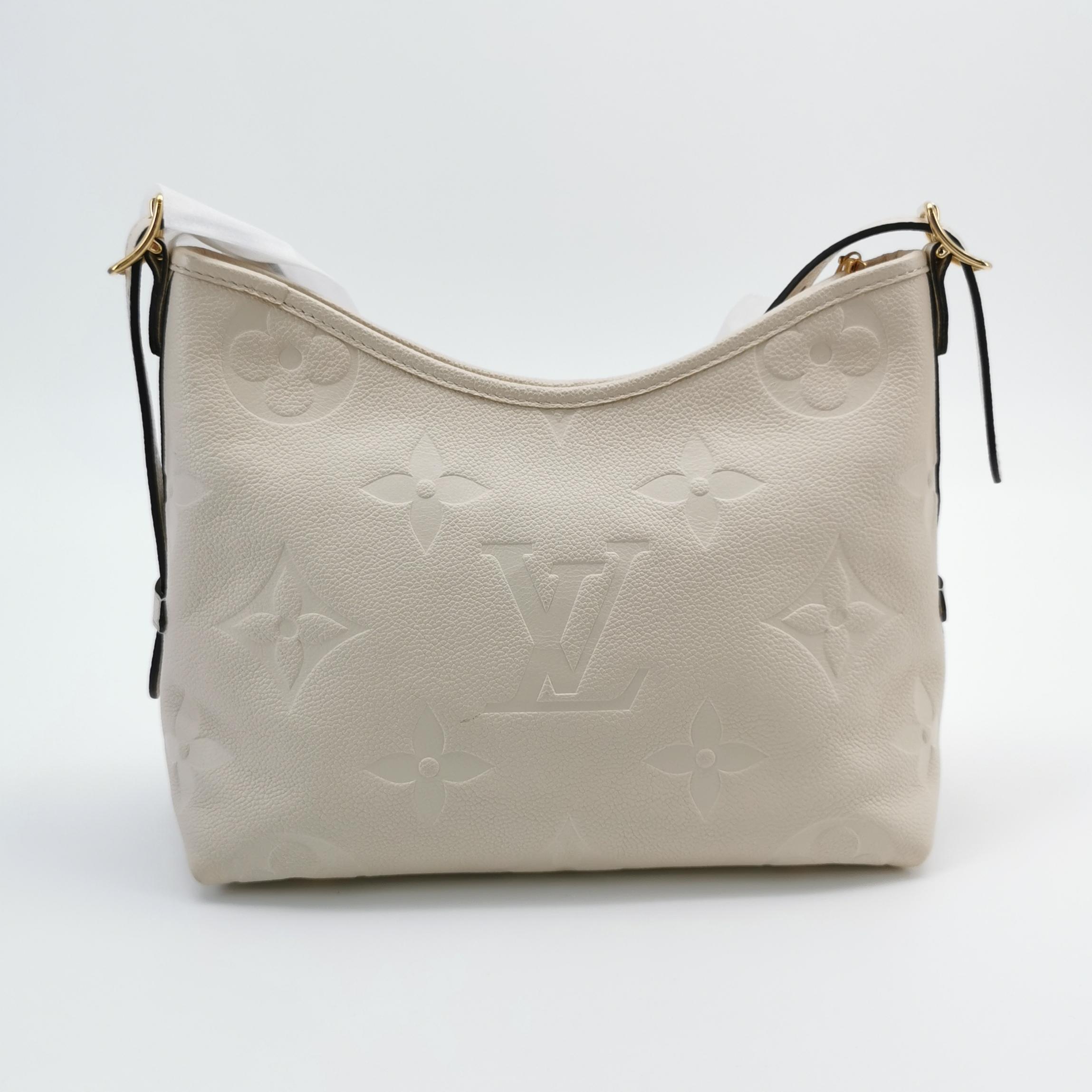Louis Vuitton CarryAll PM in Beige Monogram Empreinte Leather view 6