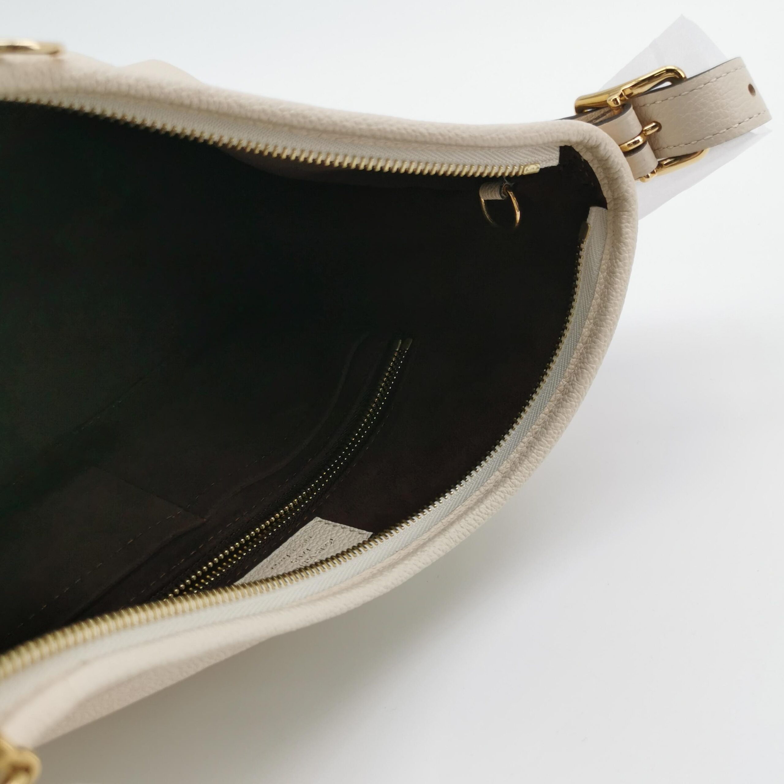 Louis Vuitton CarryAll PM in Beige Monogram Empreinte Leather view 4