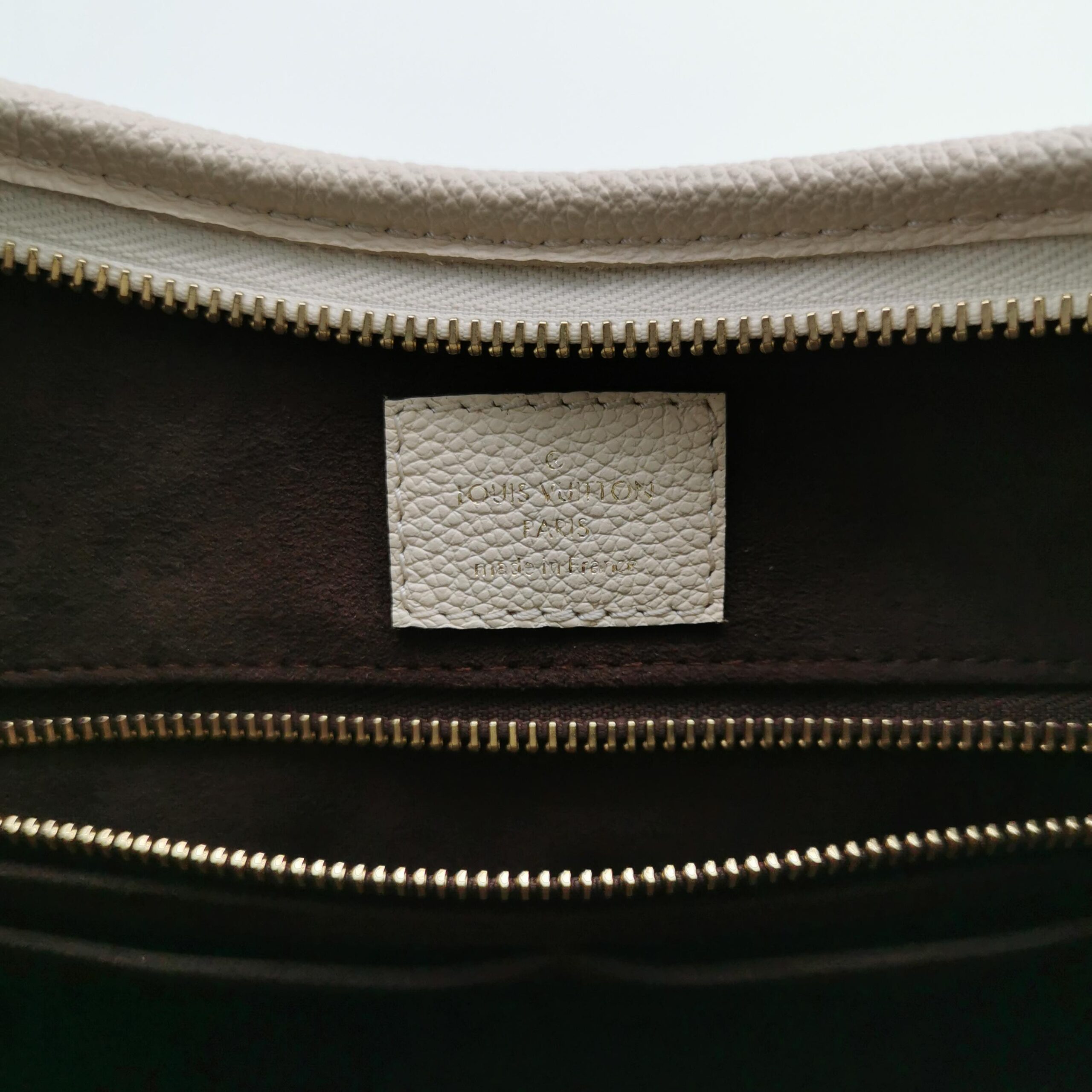 Louis Vuitton CarryAll PM in Beige Monogram Empreinte Leather view 3