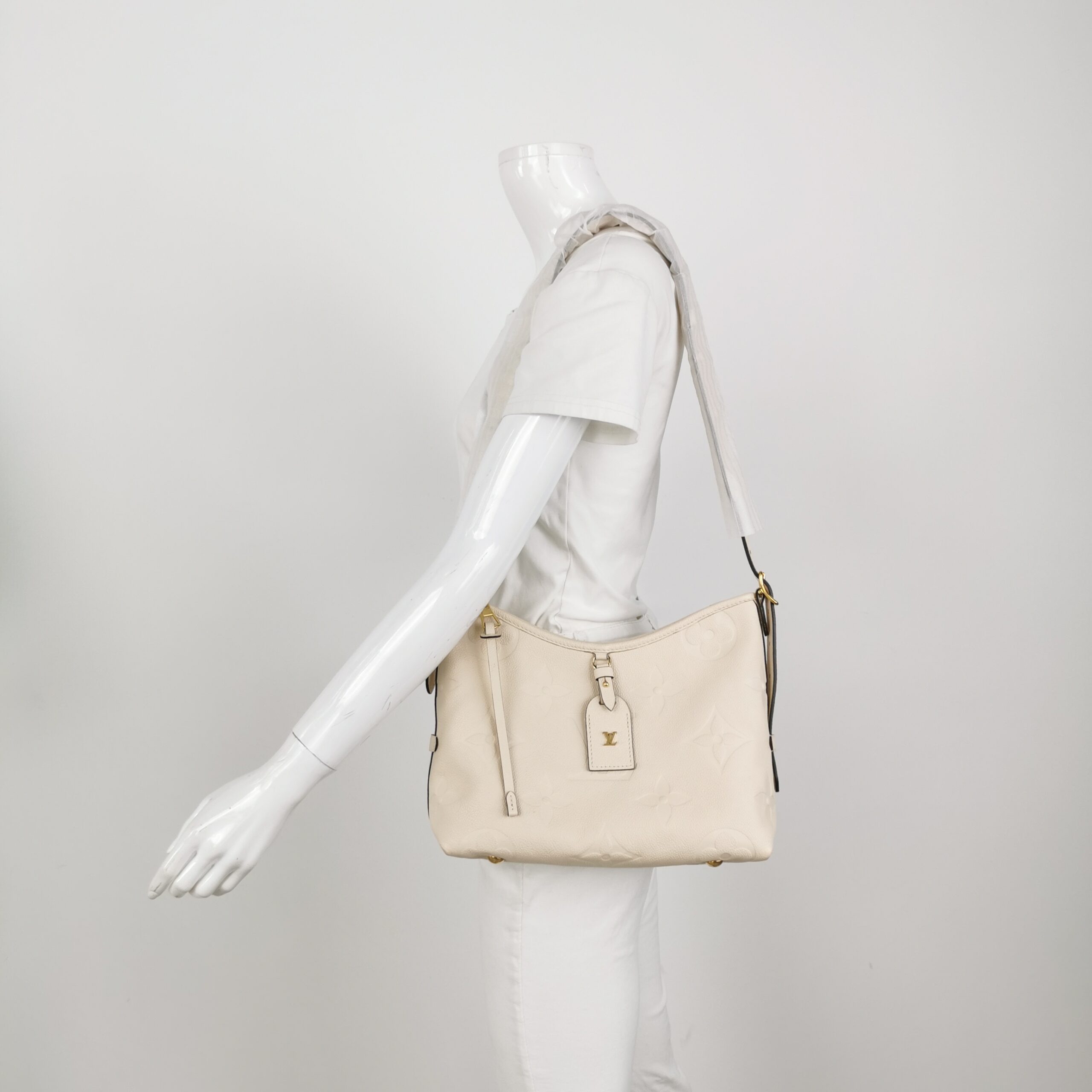 Louis Vuitton CarryAll PM in Beige Monogram Empreinte Leather view 2